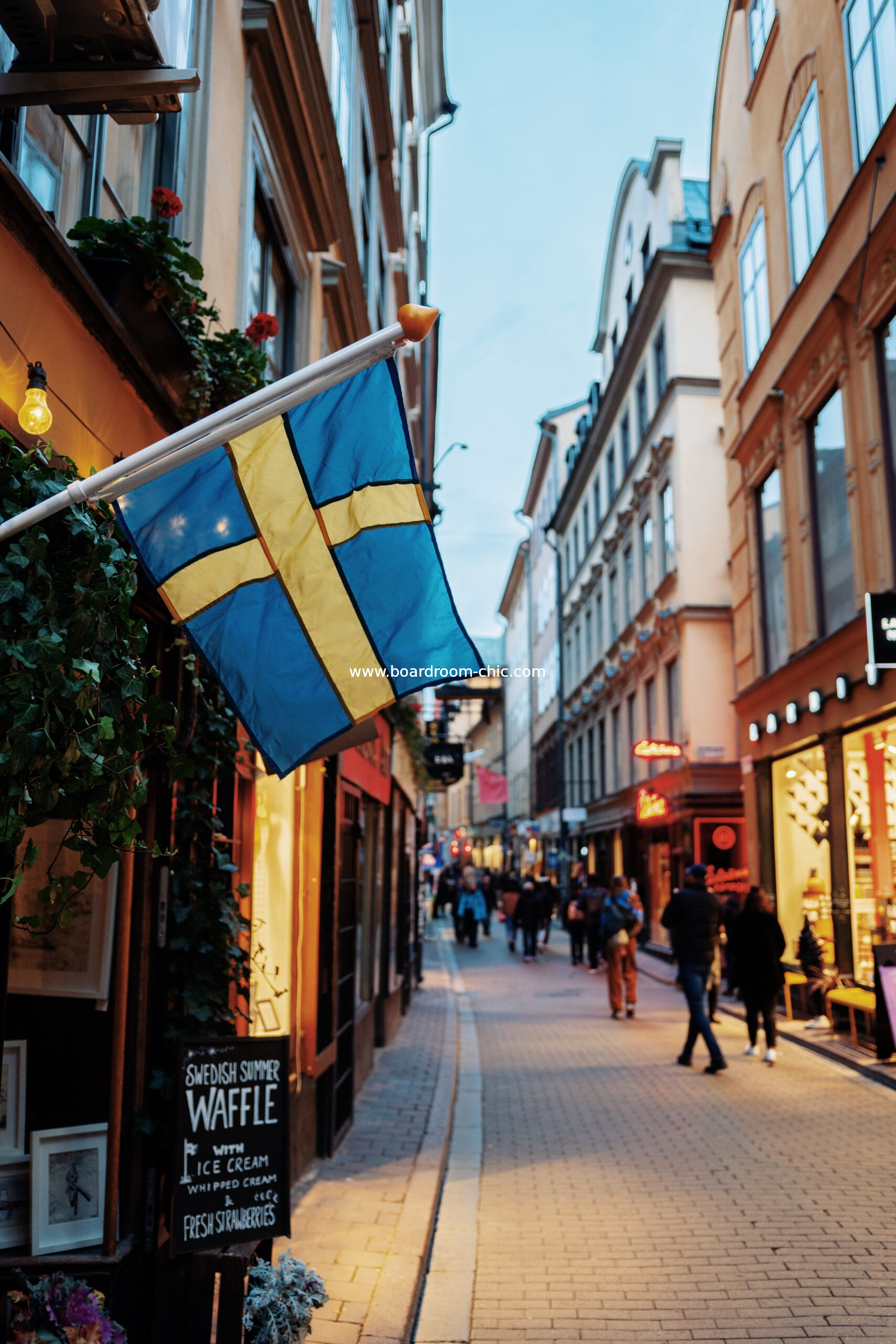 Sweden flag against the backdrop of a beautiful street